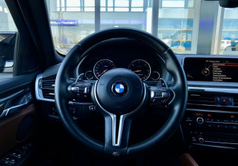 Подержанный автомобиль BMW X6 2014 года (13 фото)
