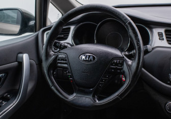 Подержанный автомобиль Kia Ceed Wagon 2014 года (15 фото)