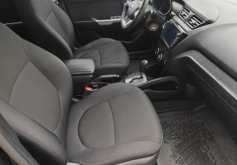 Подержанный автомобиль Kia Rio Hatchback 2014 года (9 фото)