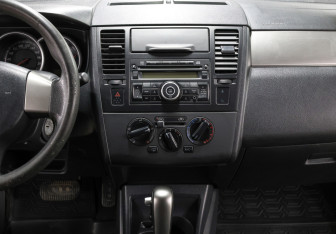 Подержанный автомобиль Nissan Tiida Sedan 2011 года (15 фото)