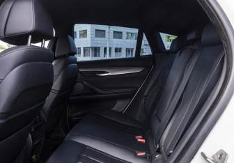 Подержанный автомобиль BMW X6 2017 года (13 фото)