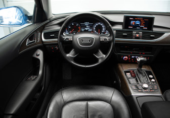 Подержанный автомобиль Audi A6 allroad 2014 года (8 фото)