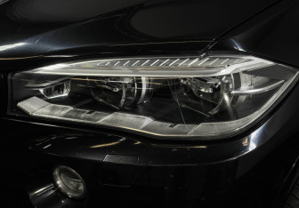 Подержанный автомобиль BMW X5 2014 года (7 фото)