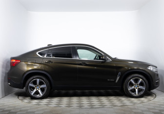 Подержанный автомобиль BMW X6 2015 года (4 фото)