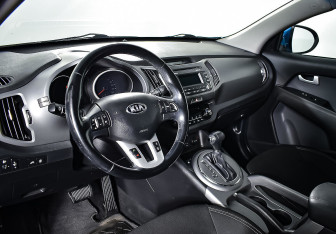Подержанный автомобиль Kia Sportage 2015 года (10 фото)