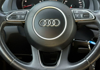 Подержанный автомобиль Audi Q3 2015 года (15 фото)