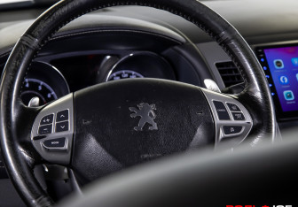 Подержанный автомобиль Peugeot 4007 2011 года (9 фото)