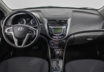 Подержанный автомобиль Hyundai Solaris Sedan 2013 года (13 фото)