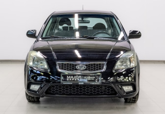 Подержанный автомобиль Kia Rio Hatchback 2011 года (2 фото)