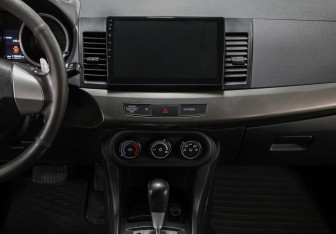 Подержанный автомобиль Mitsubishi Lancer Sedan 2012 года (15 фото)