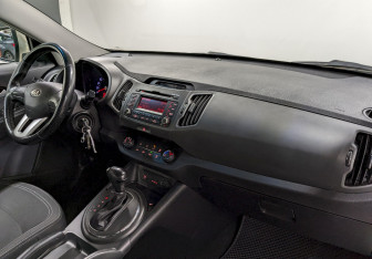 Подержанный автомобиль Kia Sportage 2012 года (19 фото)