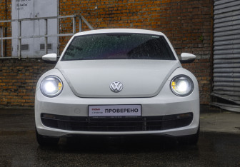 Подержанный автомобиль Volkswagen Beetle Hatchback 2013 года (2 фото)