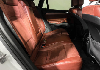 Подержанный автомобиль BMW X6 2011 года (14 фото)