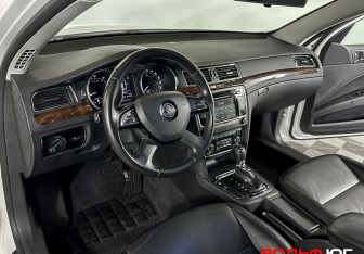 Подержанный автомобиль Skoda Superb Liftback 2014 года (22 фото)