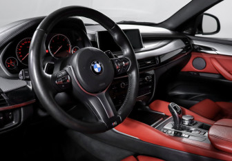 Подержанный автомобиль BMW X6 2016 года (14 фото)