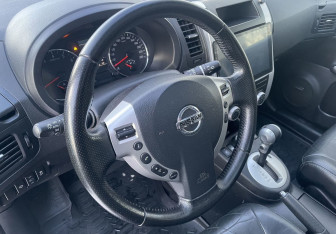 Подержанный автомобиль Nissan X-Trail 2013 года (14 фото)
