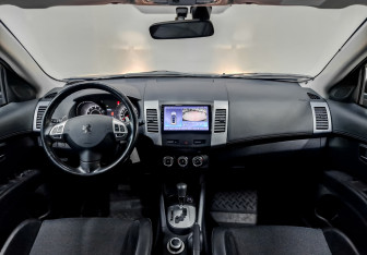 Подержанный автомобиль Peugeot 4007 2011 года (14 фото)