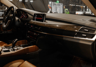 Подержанный автомобиль BMW X6 2016 года (7 фото)