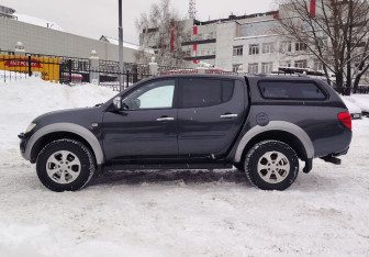 Подержанный автомобиль Mitsubishi L200 2011 года (5 фото)