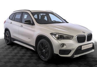 Подержанный автомобиль BMW X1 2017 года (3 фото)