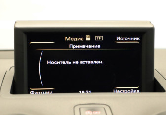 Подержанный автомобиль Audi A1 2014 года (10 фото)