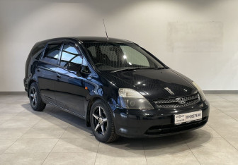 Подержанный автомобиль Honda Stream 2002 года (3 фото)