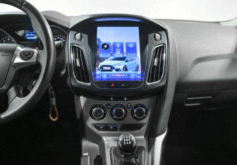 Подержанный автомобиль Ford Focus Sedan 2014 года (7 фото)