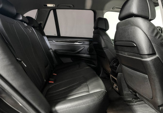 Подержанный автомобиль BMW X5 2015 года (14 фото)