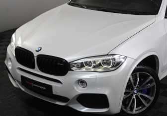 Подержанный автомобиль BMW X5 2015 года (23 фото)