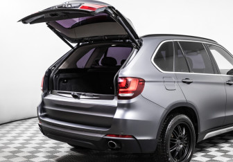 Подержанный автомобиль BMW X5 2015 года (15 фото)