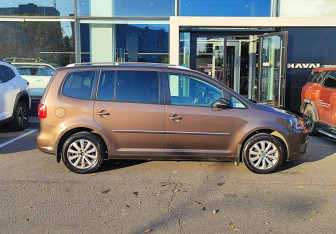 Подержанный автомобиль Volkswagen Touran 2012 года (4 фото)