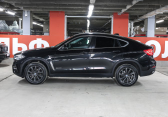Подержанный автомобиль BMW X6 2015 года (8 фото)