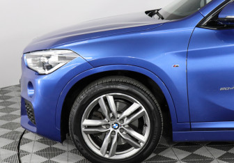 Подержанный автомобиль BMW X1 2016 года (8 фото)