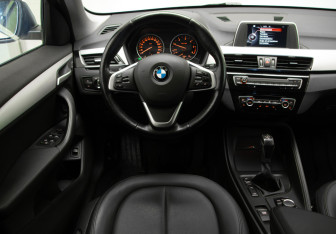 Подержанный автомобиль BMW X1 2015 года (9 фото)