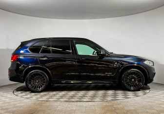 Подержанный автомобиль BMW X5 2016 года (18 фото)
