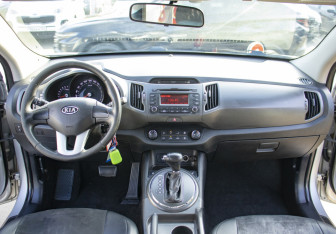 Подержанный автомобиль Kia Sportage 2012 года (9 фото)