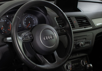 Подержанный автомобиль Audi Q3 2014 года (13 фото)