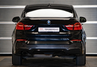 Подержанный автомобиль BMW X4 2015 года (5 фото)