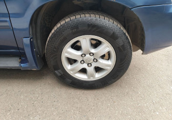Подержанный автомобиль Toyota Highlander 2002 года (11 фото)