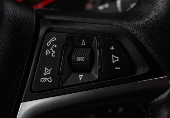 Подержанный автомобиль Opel Astra Sedan 2014 года (13 фото)