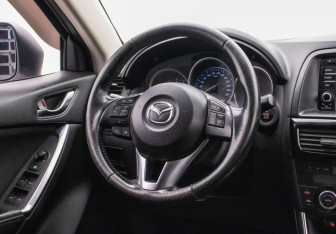 Подержанный автомобиль Mazda CX-5 2014 года (15 фото)