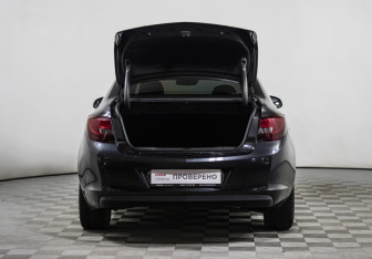 Подержанный автомобиль Opel Astra Sedan 2013 года (15 фото)