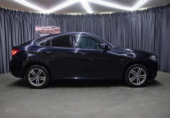 Подержанный автомобиль BMW X6 2017 года (4 фото)