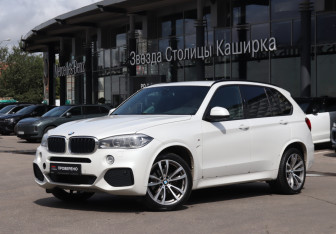 Подержанный автомобиль BMW X5 2015 года (25 фото)