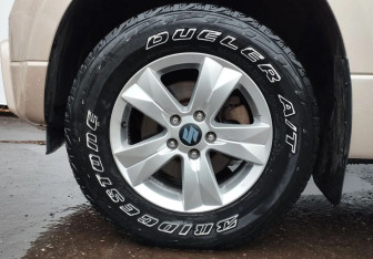 Подержанный автомобиль Suzuki Grand Vitara 2010 года (13 фото)