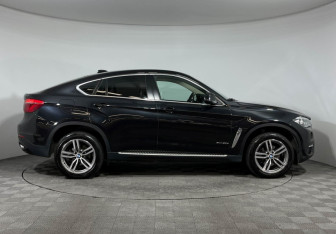 Подержанный автомобиль BMW X6 2015 года (6 фото)