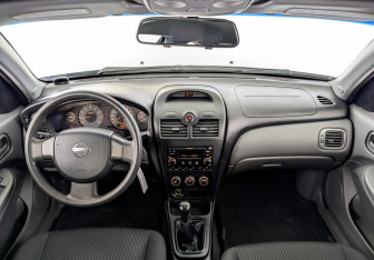 Подержанный автомобиль Nissan Almera Classic 2009 года (14 фото)