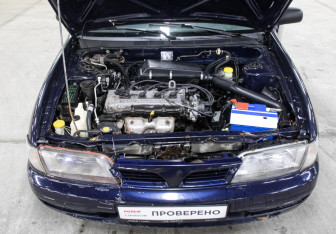 Подержанный автомобиль Nissan Almera Hatchback 1997 года (5 фото)