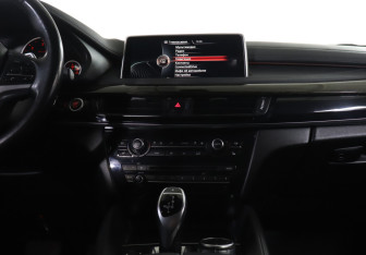 Подержанный автомобиль BMW X6 2016 года (14 фото)