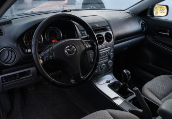 Подержанный автомобиль Mazda 6 Sedan 2005 года (12 фото)